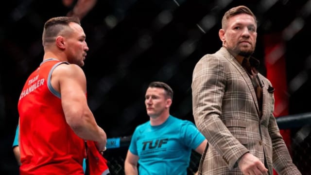 Michael Chandler and Conor McGregor inside the UFC Octagon on the set of "The Ultimate Fighter" (TUF 31).